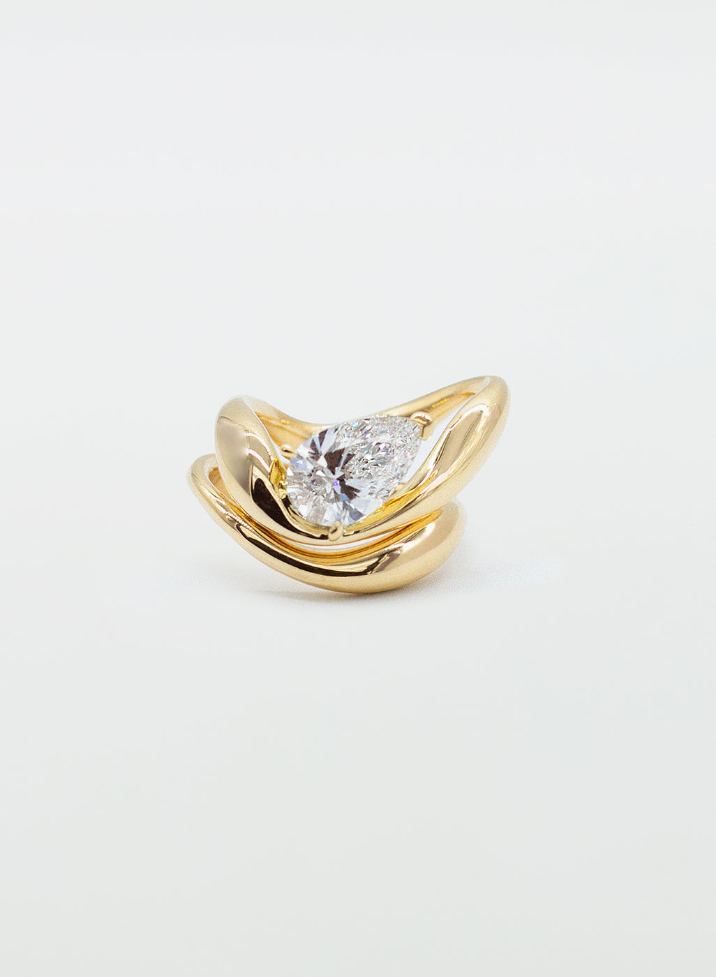 Floating Pear Diamond Engagement Ring