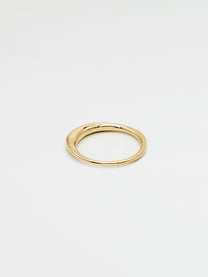 A simple, elegant gold band ring with a high shine finish, showing the front view on a white background.